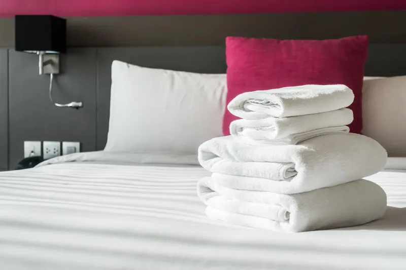 Freshly prepared hotel bed linen