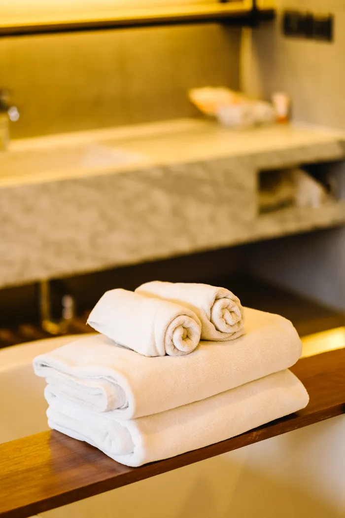 Luxury hotel bedding prepared to a guest-ready standard